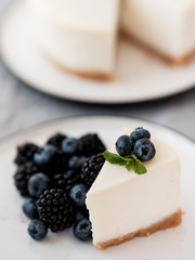 portion of cheesecake with berries. Delicious pastries. Vegan food