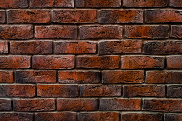 Texture. Part of a burnt Dark Brown brick wall