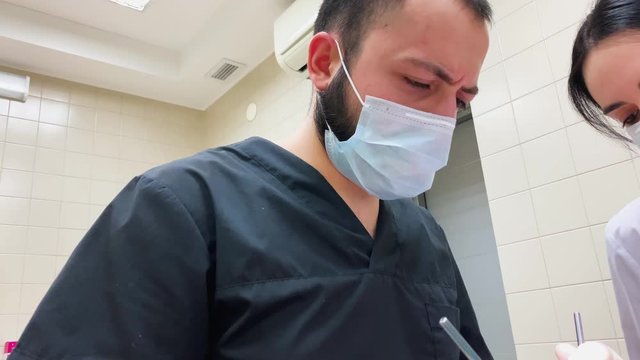 doctor dentist performs surgery and is horrified of what he saw . pulpitis caries