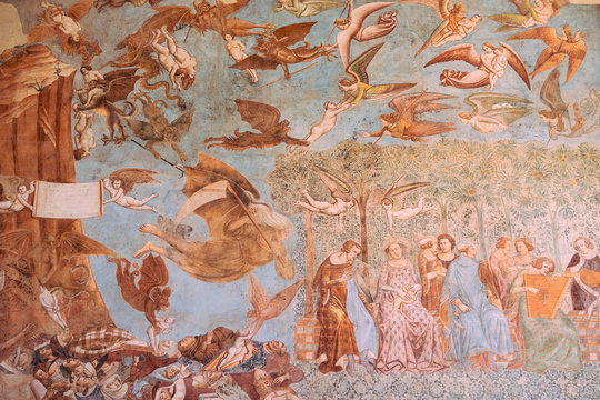 Part of frescoes "Triumph of Death", or "Last Judgement" by Buonamico Buffalmacco, 1336-1341, renovated fresco inside the Campo Santo  cemetery, Pisa Italy. Camposanto monumentale.