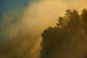 Fog at sunrise in the mountains.