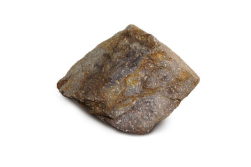 rhyolite rock isolated on white background. Rhyolite is an igneous, volcanic rock, of felsic (silica-rich) composition It may have any texture from glassy to aphanitic to porphyritic. 