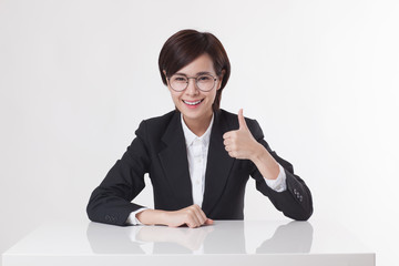 Young Asian short hair female model in formal dress which is good for business purpose