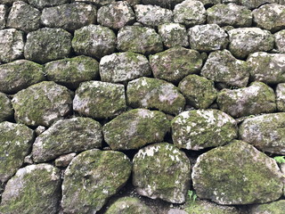 The texture of the old stones wall as a background.