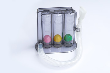 Triflow incentive spirometer for inhalation exercise on white background, Triball 