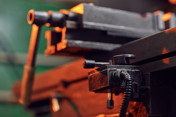 Close-up of metal lathe for metal work in the workshop