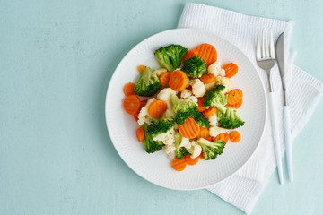 Mix of boiled vegetables. Broccoli, carrots, cauliflower. Steamed vegetables for dietary...