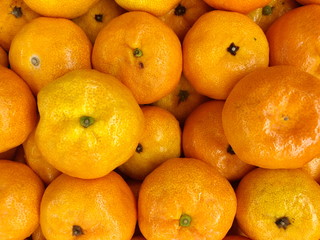 Fresh fruit oranges on market for background