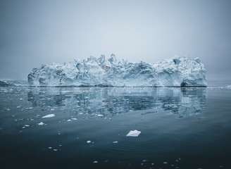 Iceberg and ice from glacier in arctic nature landscape in Ilulissat,Greenland. Aerial drone photo...