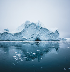 Iceberg and ice from glacier in arctic nature landscape in Ilulissat,Greenland. Aerial drone photo...