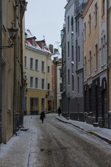 Fototapeta na wymiar Narrow street in Old Town Tallinn in winter. Estonia