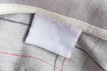 laundry care clothing label on fabric texture