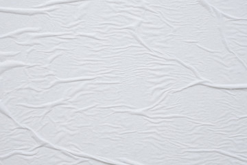 Blank white crumpled and creased paper poster texture background