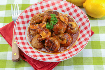 meatballs with tomato sauce on a plate