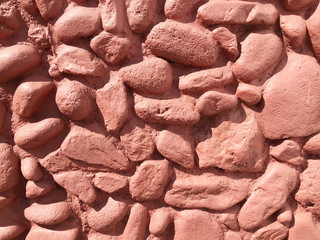 Decorative red small stone background.