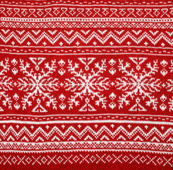 Red knitted fabric with nordic geometric ornament