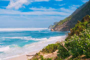 Beautiful beach with turquoise ocean in Bali.