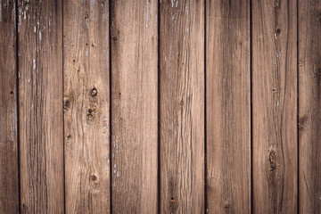 Naklejka premium Texture of wooden boards of tree. Vintage wooden fence, desk surface. Natural color. Weathered timber, background. Rustic table of oak. Brown old wood planks.