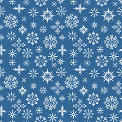 Seamless pattern. Different white snowflakes on a deep blue background. Winter texture for print, wallpaper, home decor, textile, package design, invitation or website background.