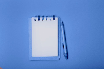 Blank notebook with pencil