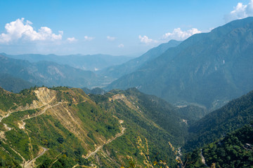 Road from Kausani to Nainital in picture perfect view of the Uttarakhand landscape