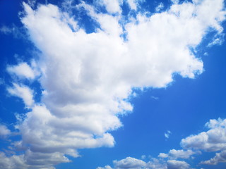 Beautiful blue sky and cloud background on sunshine day.
