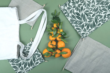 Mandarins and cotton, reusable bags and baggies.