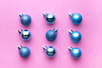 Christmas background. Xmas balls isolated on pink. Bubble pattern decoration. Flat lay. Winter concept