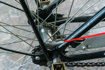 Fototapeta premium Bicycle chain lubrication with oil spray
