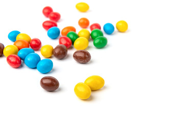 Color dragee isolated on white background.