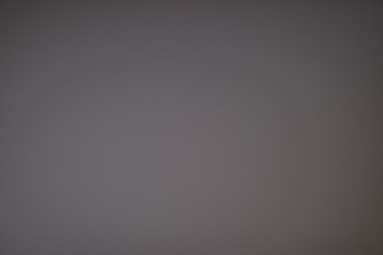 blurred gray background, grey blank screen