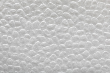 Obraz na płótnie Canvas white embossed paper surface matte background. close-up napkin or towel