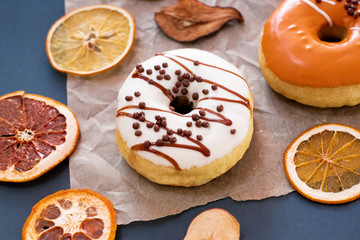 Colorful donuts on the table. close up view. copy space