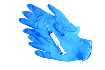 Gloves and syringe isolated on white. Healthcare And Medical concept.