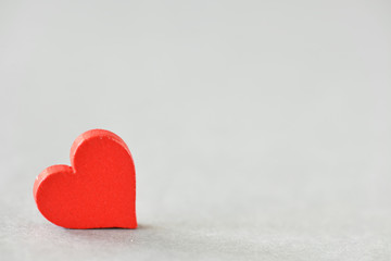 Fototapeta premium A red heart with a blurred background. High resolution photo.