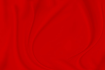 abstract smooth elegant red fabric texture background,flowing satin wave. christmas background.