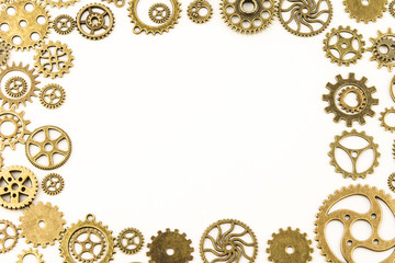 metallic gears background / Closeup of metal cog gears / close up texture pattern steampunk style and old mechanical peaces / decorative frame