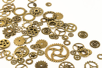 metallic gears background / Closeup of metal cog gears / close up texture pattern steampunk style and old mechanical peaces / decorative frame