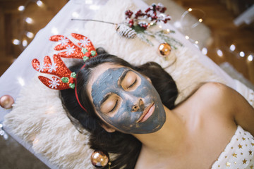 Woman with face mask at wellness center