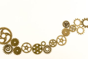 metallic gears background / Closeup of metal cog gears / close up texture pattern steampunk style and old mechanical peaces / decorative frame