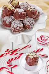 Chocolate Coconut Almond Balls on a cake stand