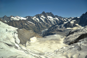 A beautiful peak and panoramic snow mountain view of Jungfraujoch. One of the most popular experiences in the beautiful Bernese Oberland is the train journey to Jungfraujoch, the "Top of Europe".