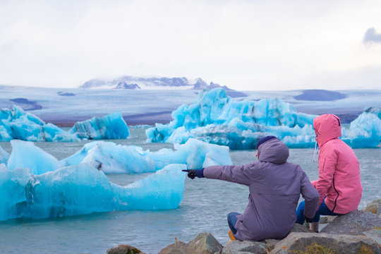 Beautiful photo of Jokulsarlon Glacial lake full of blue floating icebergs.