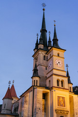 Fototapeta na wymiar Saint Nicholas Church at night Brasov City, Transilvania, Romania. Biserica Sfantul Nicolae