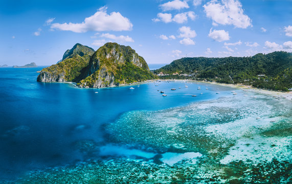 Aerial panoramic view of Corong Corong lagoon with moored boats. El Nido village, Palawan, Philippines
