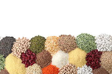 Different types of legumes and cereals on white background, top view. Organic grains