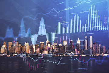 Financial graph on night city scape with tall buildings background double exposure. Analysis concept.