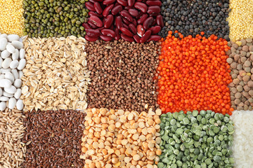 Different grains and cereals as background, top view