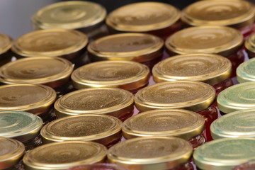 fruit jam jars with lids on