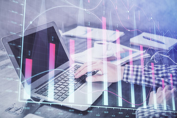 Double exposure of forex chart with man working on computer on background. Concept of market analysis.